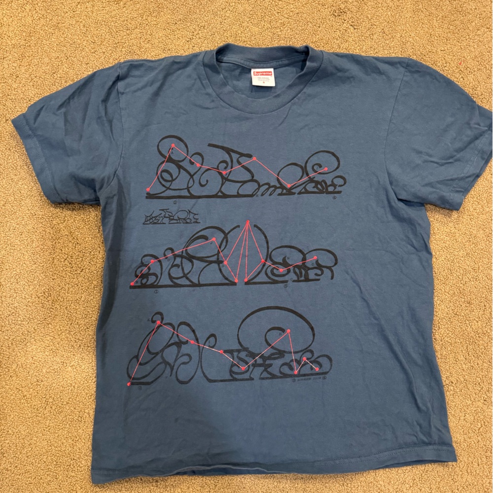 Supreme Blue Tee with Artistic Black Design